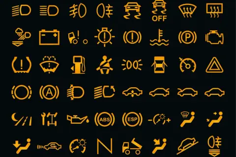 Żółta opis kontrolek na desce rozdzielczej: światła, akumulator, hamulec, silnik, ABS, ESP, ciśnienie w oponach, pasy bezpieczeństwa, temperatura, paliwo, wycieraczki, poduszki powietrzne, kierunkowskazy, światła drogowe, światła przeciwmgielne, tempom...