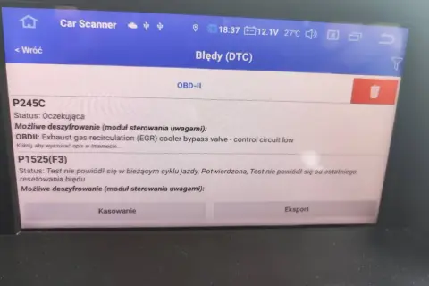 Ekran skanera diagnostycznego z błędami DTC, w tym P1525(F3) i P245C, dotyczącymi zaworu obejściowego chłodnicy EGR w Renault.